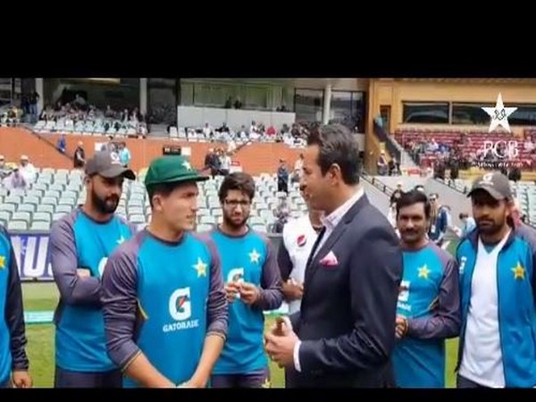 Musa Khan receives his debut cap from Wasim Akram (Photo/ PCB Twitter)