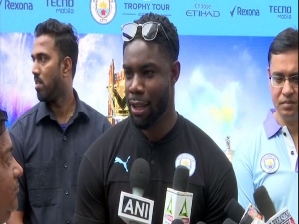 Former Manchester City player Micah Richards speaking to reporters in Mumbai on Friday. Photo/ANI