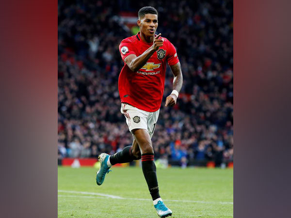 Manchester United's Marcus Rashford celebrates after scoring goal against Brighton. 