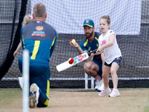 David Warner bowling to her daughter in the nets on Wednesday. (Photo/ ICC Twitter) 