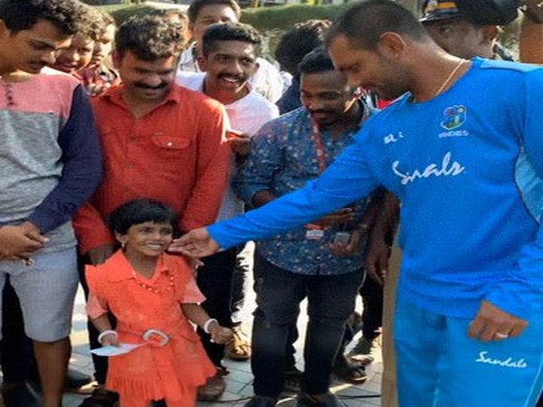 Ramdin with his 4-year-old fan.