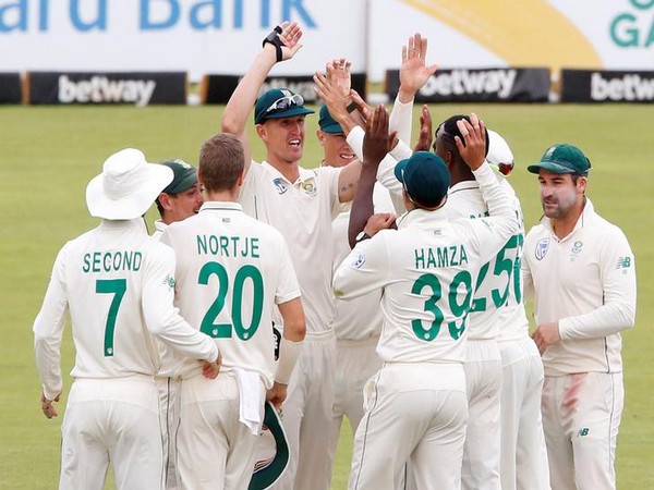 South African team celebrating after winning the Test by 107 runs. 