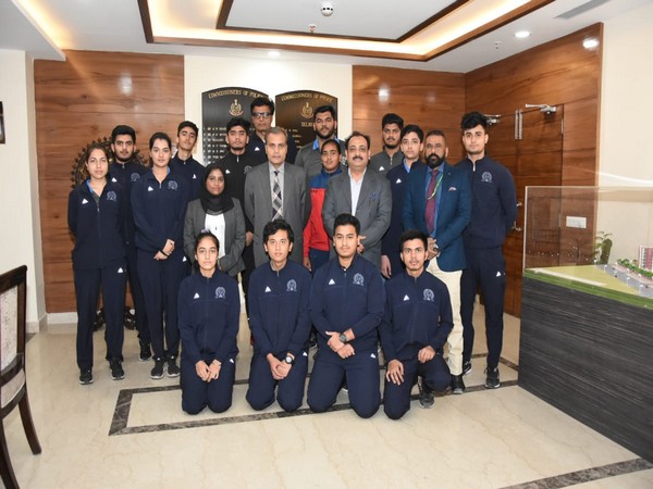 Commissioner of Police Amulya Patnaik with the young sports persons nurtured under 'Mission Olympic 2020' in New Delhi on Monday. Photo/ANI