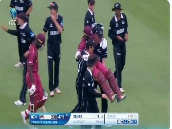 New Zealand players carrying Windies' batter off the field (Photo/ Cricket World Cup Twitter)