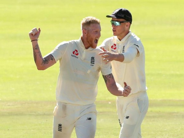 England's Ben Stokes and Sam Curran celebrate after winning the second test