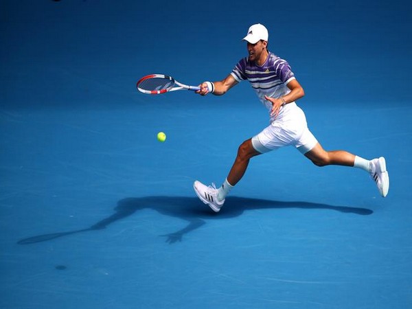 Dominic Thiem playing a shot. 