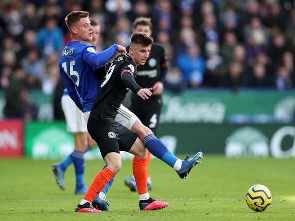 Chelsea's Mason Mount in action with Leicester City's Harvey Barnes