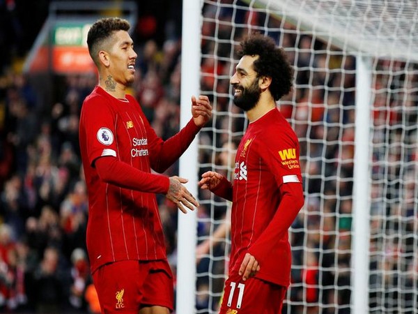 Liverpool's Roberto Firmino with Mohamed Salah 