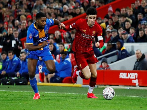 Liverpool's Curtis Jones (right) 